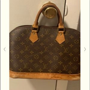 Preloved Louis Vuitton Alma bag